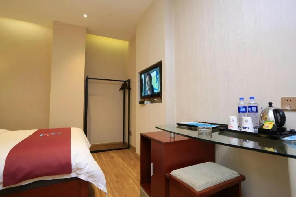 Bed in PAI Hotel Guangzhou North Gate of Chimelong Zoo