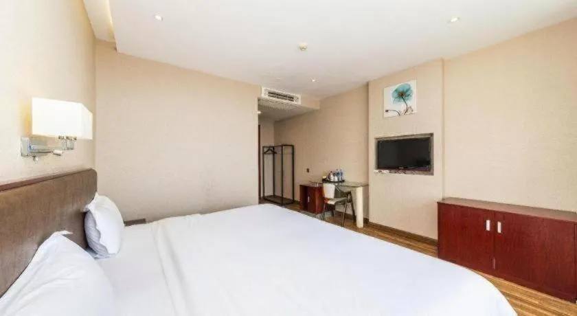 Bed in PAI Hotel Guangzhou North Gate of Chimelong Zoo