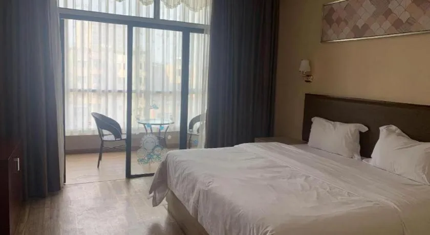 Bed in PAI Hotel Guangzhou North Gate of Chimelong Zoo