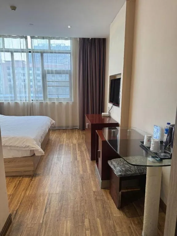 Bed in PAI Hotel Guangzhou North Gate of Chimelong Zoo