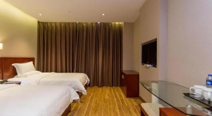 Bed in PAI Hotel Guangzhou North Gate of Chimelong Zoo