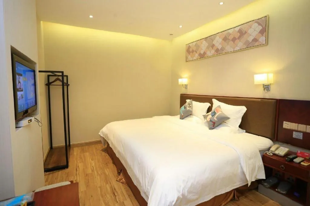 Bed in PAI Hotel Guangzhou North Gate of Chimelong Zoo