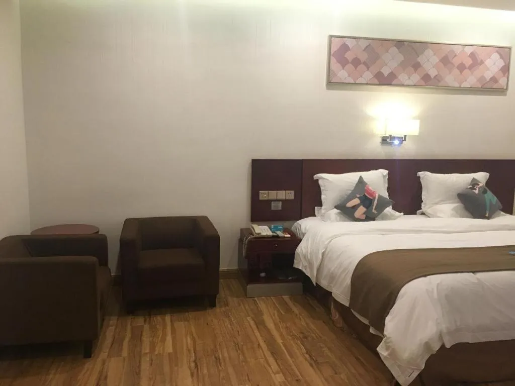 Bed in PAI Hotel Guangzhou North Gate of Chimelong Zoo