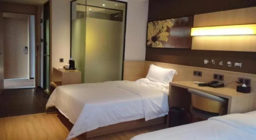Bed in IU Hotels Guangzhou Panyu Dashi Chimelong Safari Park
