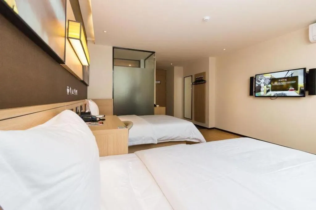 Bed in IU Hotels Guangzhou Panyu Dashi Chimelong Safari Park