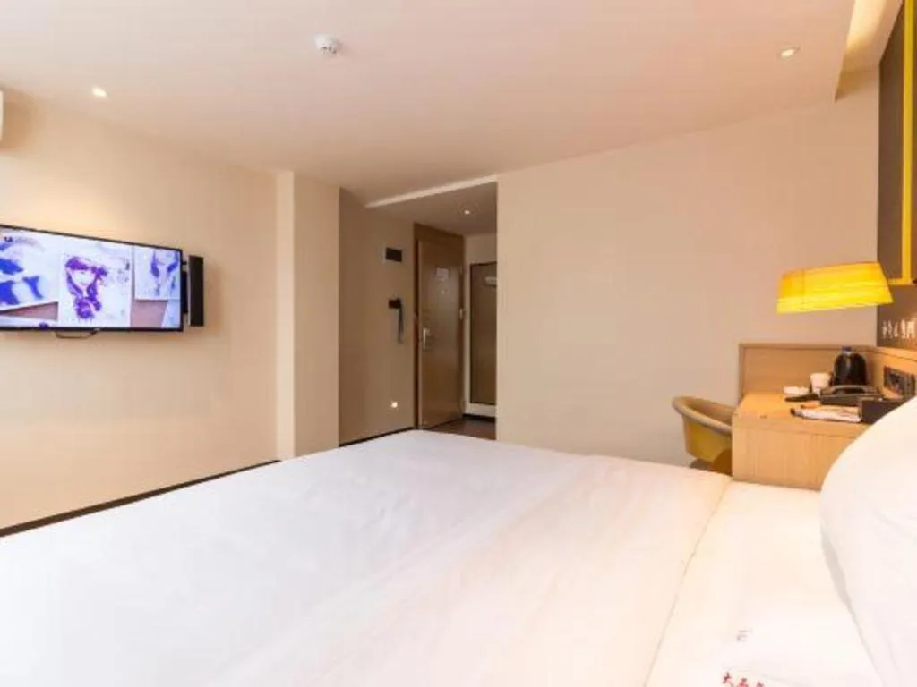 Bed in IU Hotels Guangzhou Panyu Dashi Chimelong Safari Park