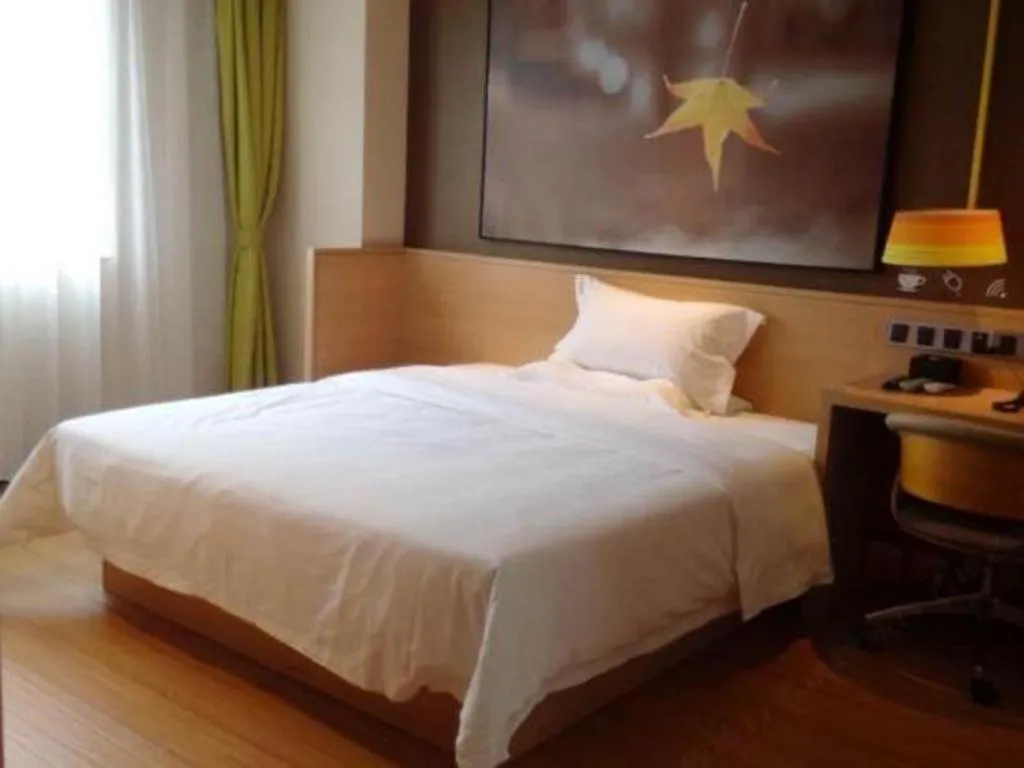 Bed in IU Hotels Guangzhou Panyu Dashi Chimelong Safari Park