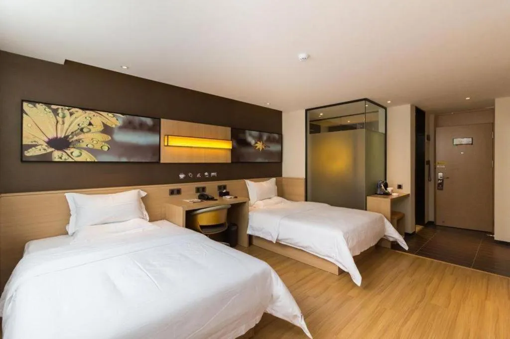 Bed in IU Hotels Guangzhou Panyu Dashi Chimelong Safari Park