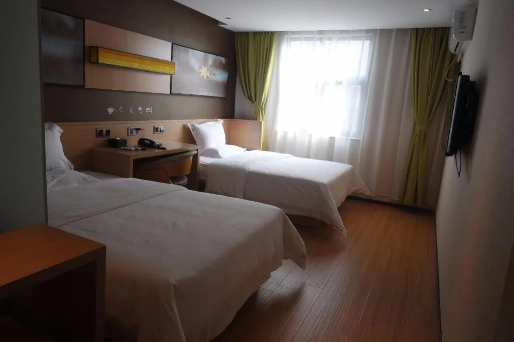 Bed in IU Hotels Guangzhou Panyu Dashi Chimelong Safari Park