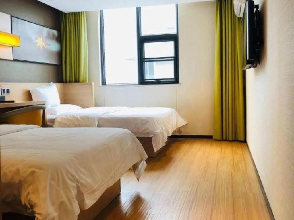 Bed in IU Hotels Guangzhou Panyu Dashi Chimelong Safari Park