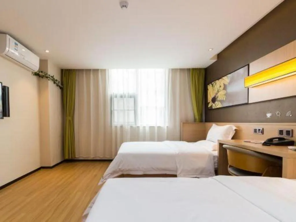 Bed in IU Hotels Guangzhou Panyu Dashi Chimelong Safari Park