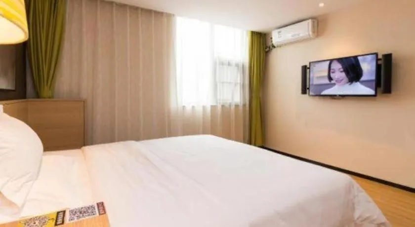 Bed in IU Hotels Guangzhou Panyu Dashi Chimelong Safari Park