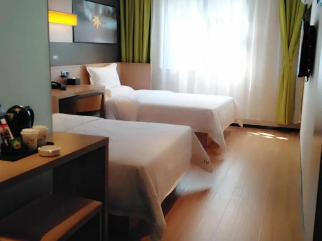 Bed in IU Hotels Guangzhou Panyu Dashi Chimelong Safari Park