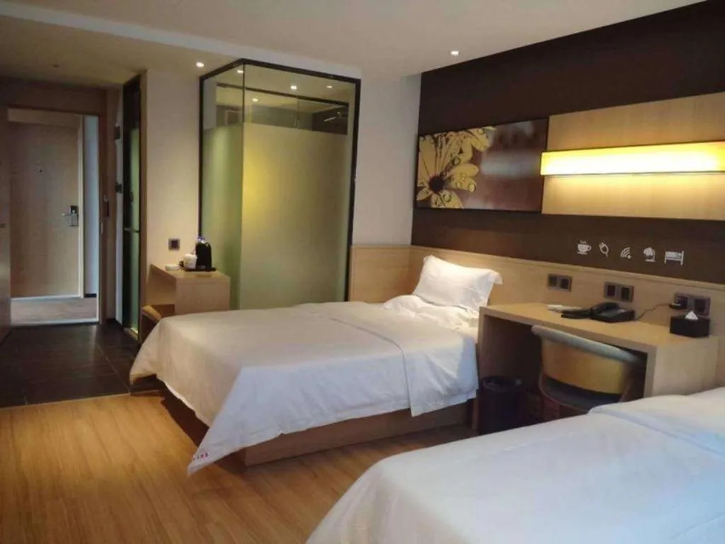 Bed in IU Hotels Guangzhou Panyu Dashi Chimelong Safari Park