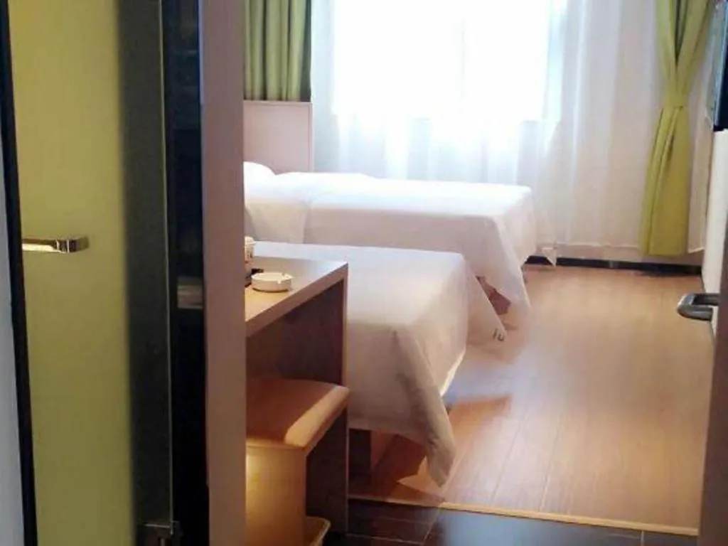 Bed in IU Hotels Guangzhou Panyu Dashi Chimelong Safari Park