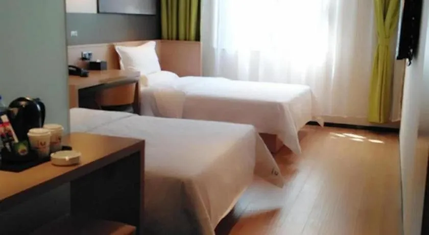 Bed in IU Hotels Guangzhou Panyu Dashi Chimelong Safari Park