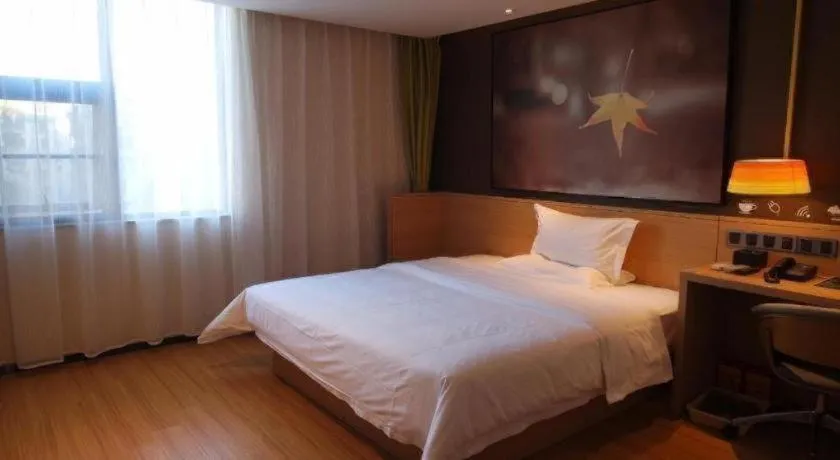 Bed in IU Hotels Guangzhou Panyu Dashi Chimelong Safari Park