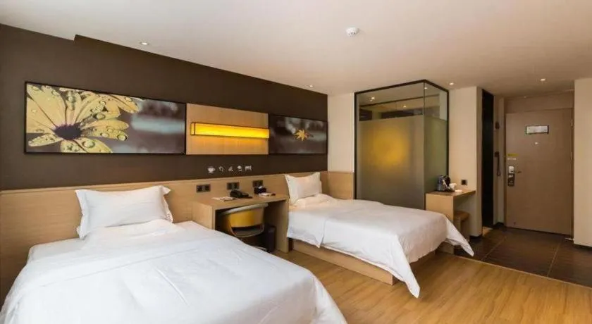 Bed in IU Hotels Guangzhou Panyu Dashi Chimelong Safari Park
