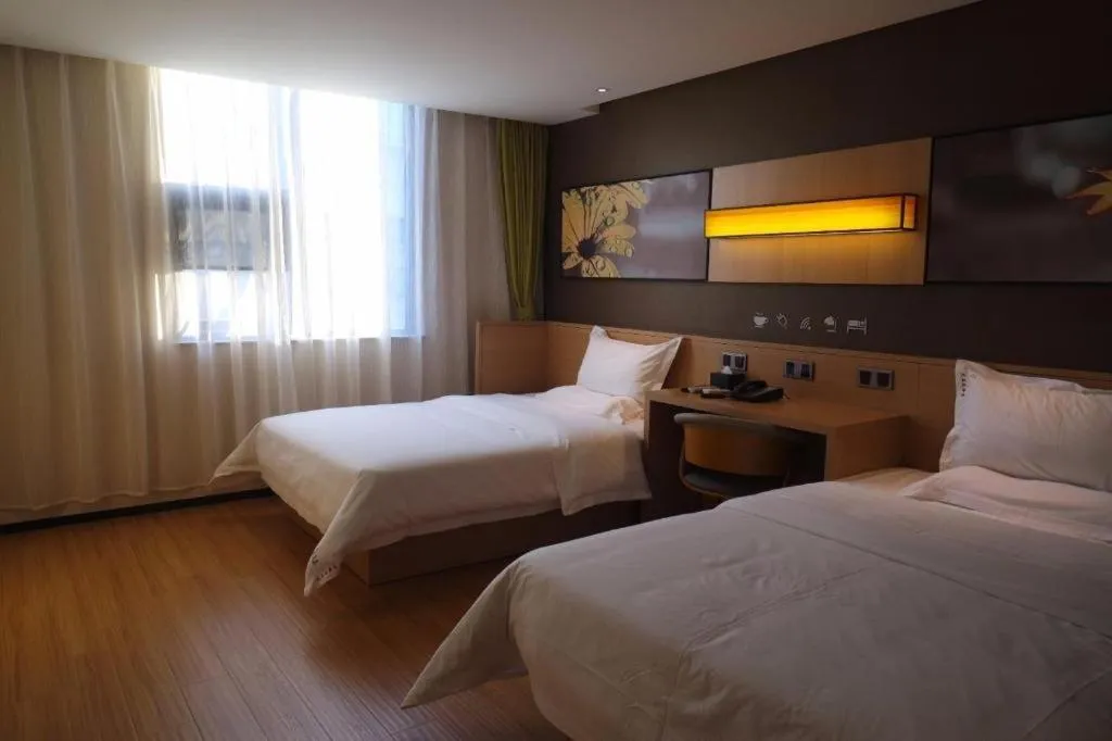 Bed in IU Hotels Guangzhou Panyu Dashi Chimelong Safari Park