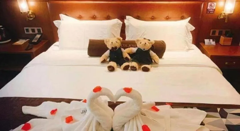 Bed in James Joyce Coffetel Shijiazhuang Century Park Shiji Huamao