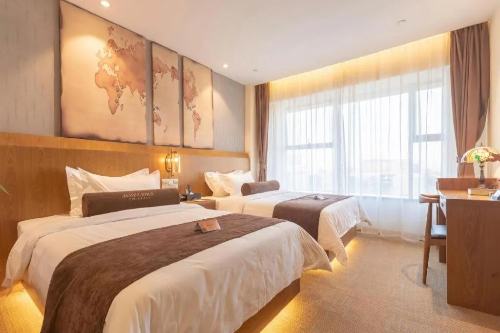 Bed in James Joyce Coffetel Shijiazhuang Century Park Shiji Huamao