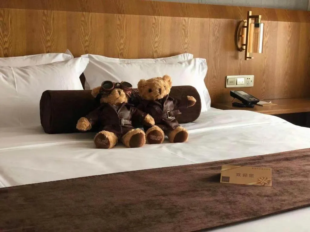 Bed in James Joyce Coffetel Shijiazhuang Century Park Shiji Huamao