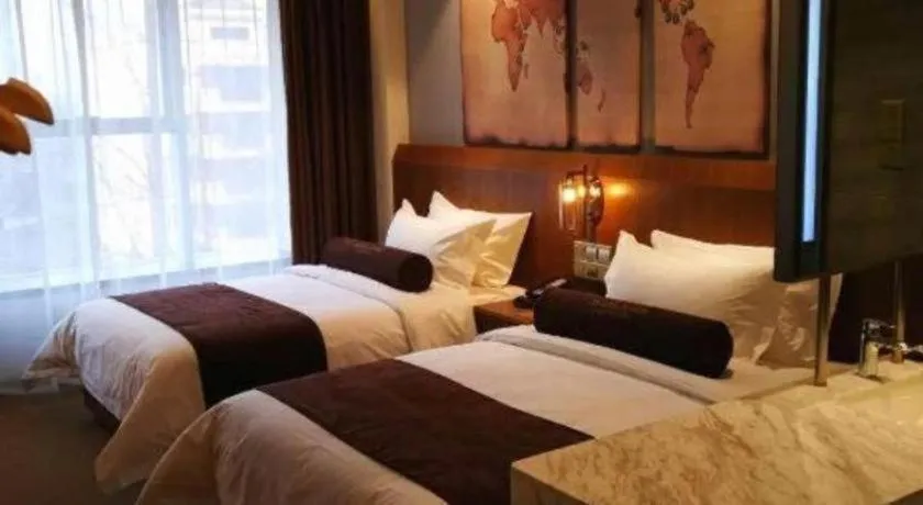 Bed in James Joyce Coffetel Shijiazhuang Century Park Shiji Huamao