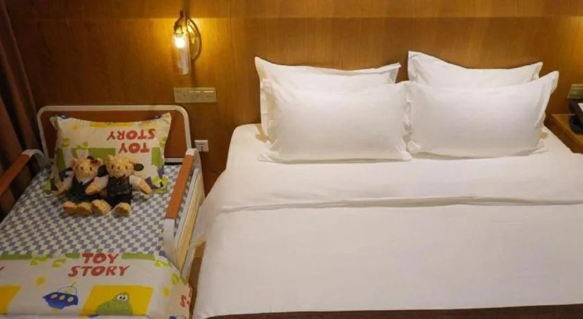 Bed in James Joyce Coffetel Shijiazhuang Century Park Shiji Huamao
