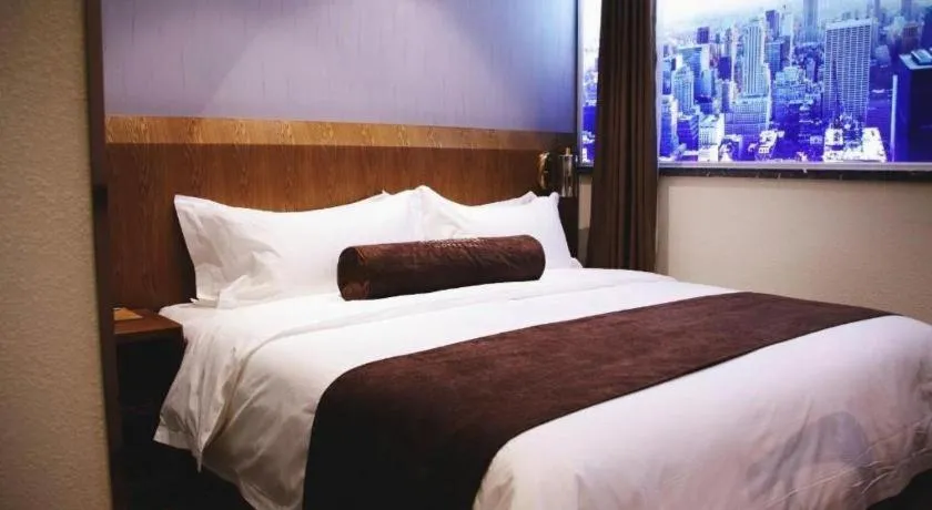 Bed in James Joyce Coffetel Shijiazhuang Century Park Shiji Huamao