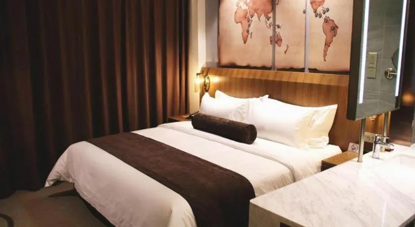 Bed in James Joyce Coffetel Shijiazhuang Century Park Shiji Huamao