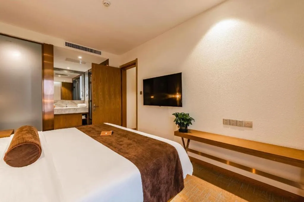 Bed in James Joyce Coffetel Shijiazhuang Century Park Shiji Huamao