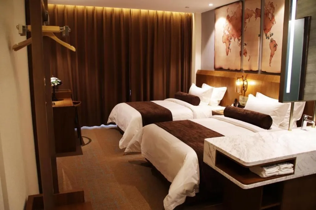 Bed in James Joyce Coffetel Shijiazhuang Century Park Shiji Huamao