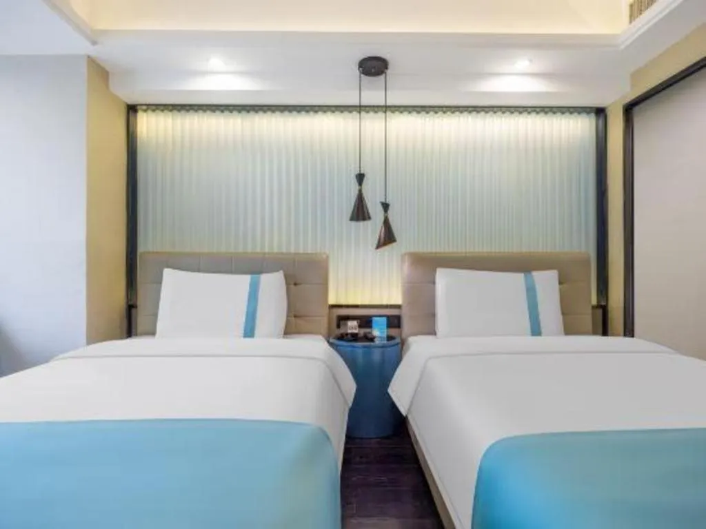 Bed in Xana Hotelle Wuhan Lingjiao Lake Wanda Plaza Branch
