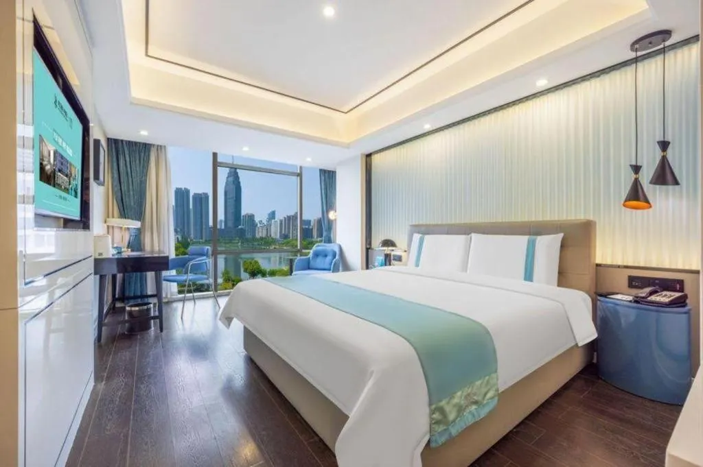 Bed in Xana Hotelle Wuhan Lingjiao Lake Wanda Plaza Branch
