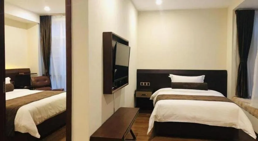 Bed in James Joyce Coffetel Wuhan Huanlegu Renhe Road Subway Station