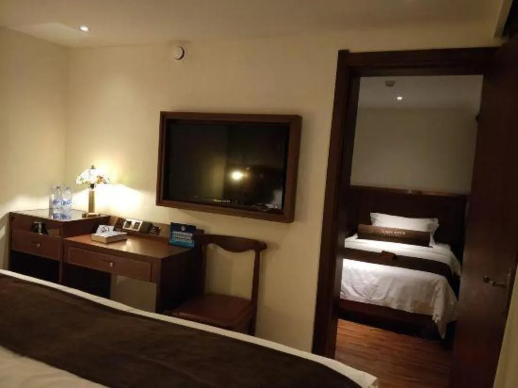 Bed in James Joyce Coffetel Beijing Qianmen Branch