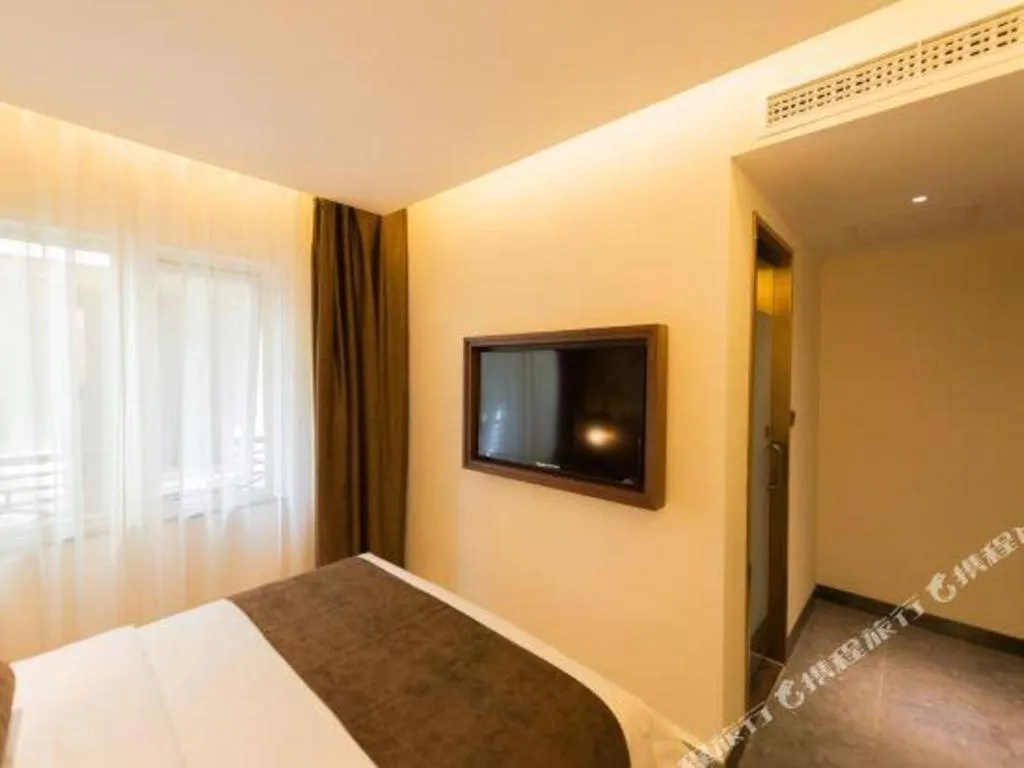 Bed in James Joyce Coffetel Beijing Qianmen Branch