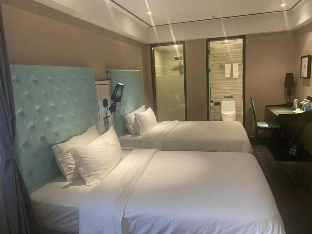 Bed in Xana Hotelle Guangzhou Tiyuxi Road Metro Station Branch