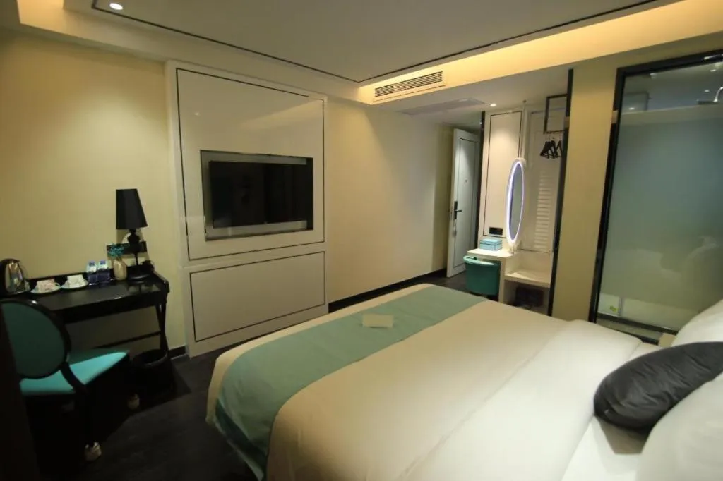 Bed in Xana Lite Hotel Shenzhen Nanshan Xilichaguang Metro Station