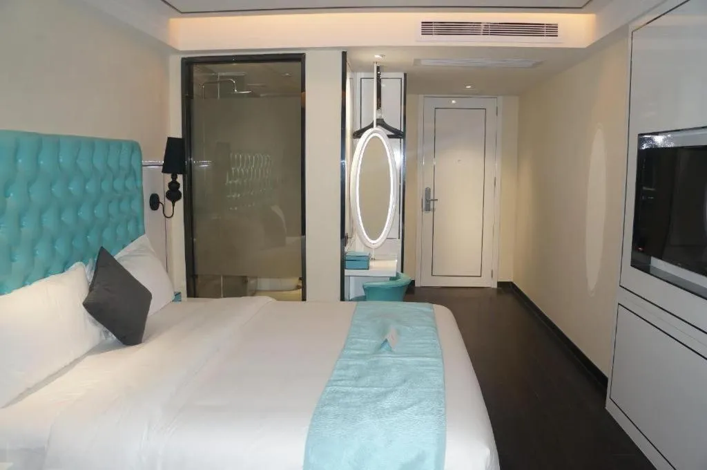 Bed in Xana Lite Hotel Shenzhen Nanshan Xilichaguang Metro Station