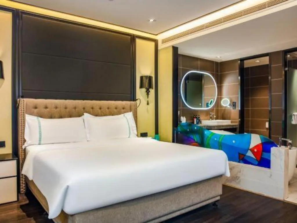 Bed in Xana Hotelle Beijing Olympic Park South Lishuiqiao Metro Station