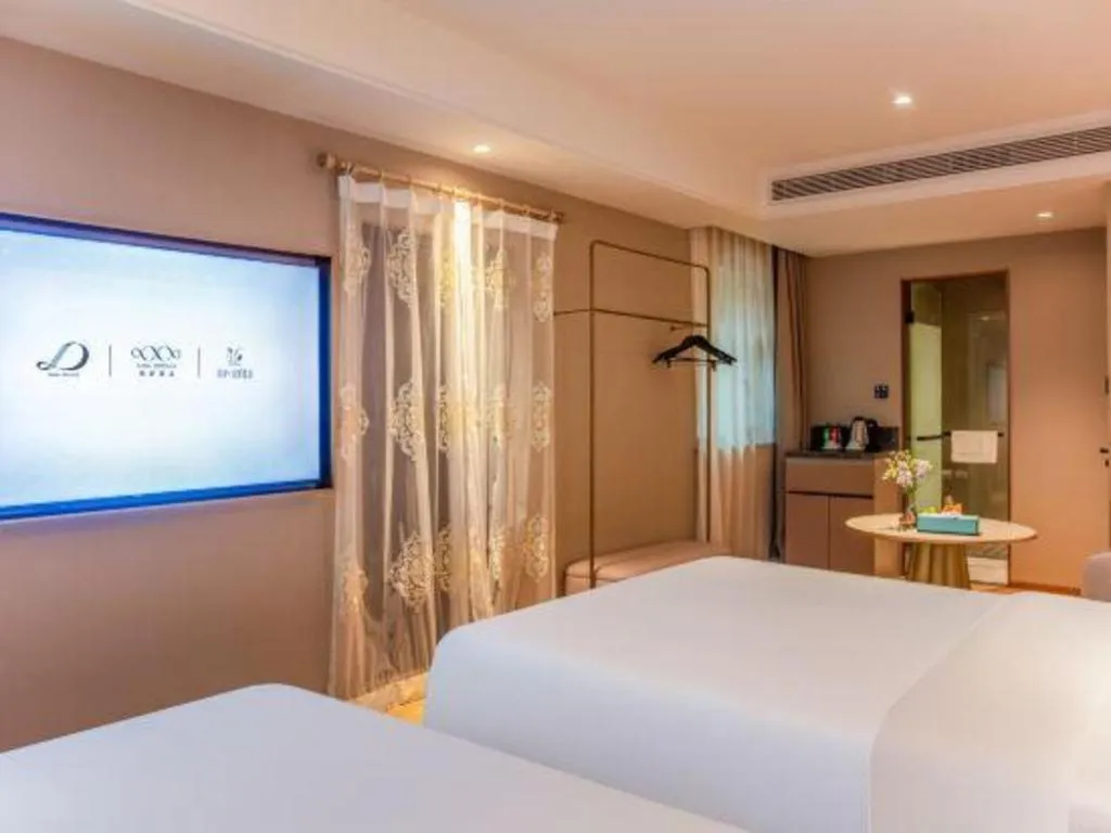 Bed in Xana Hotelle Beijing Olympic Park South Lishuiqiao Metro Station