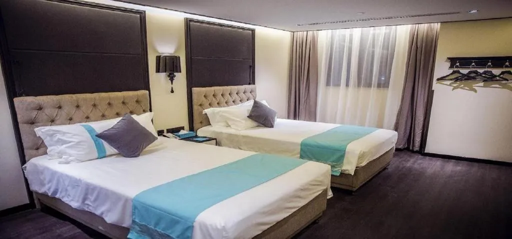 Bed in Xana Hotelle Beijing Olympic Park South Lishuiqiao Metro Station