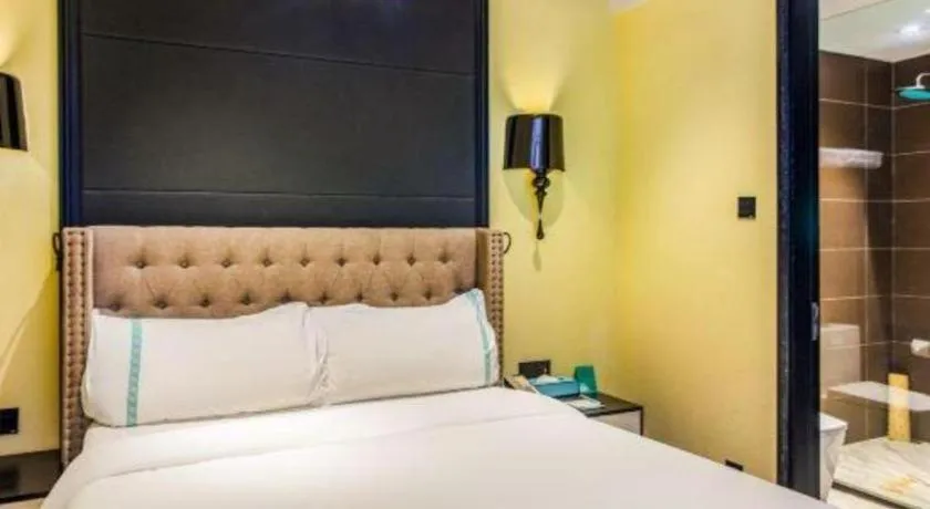 Bed in Xana Hotelle Beijing Olympic Park South Lishuiqiao Metro Station