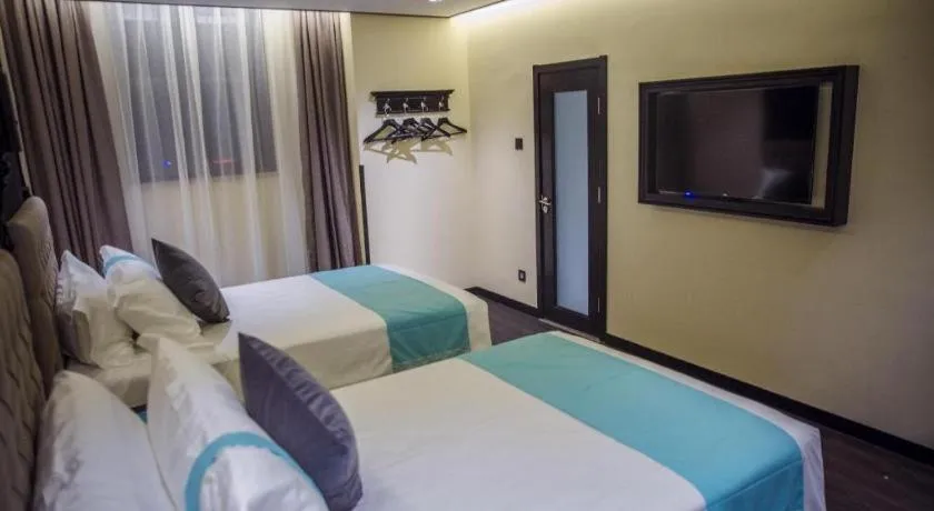 Bed in Xana Hotelle Beijing Olympic Park South Lishuiqiao Metro Station