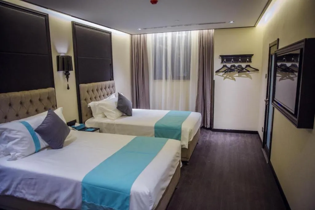 Bed in Xana Hotelle Beijing Olympic Park South Lishuiqiao Metro Station