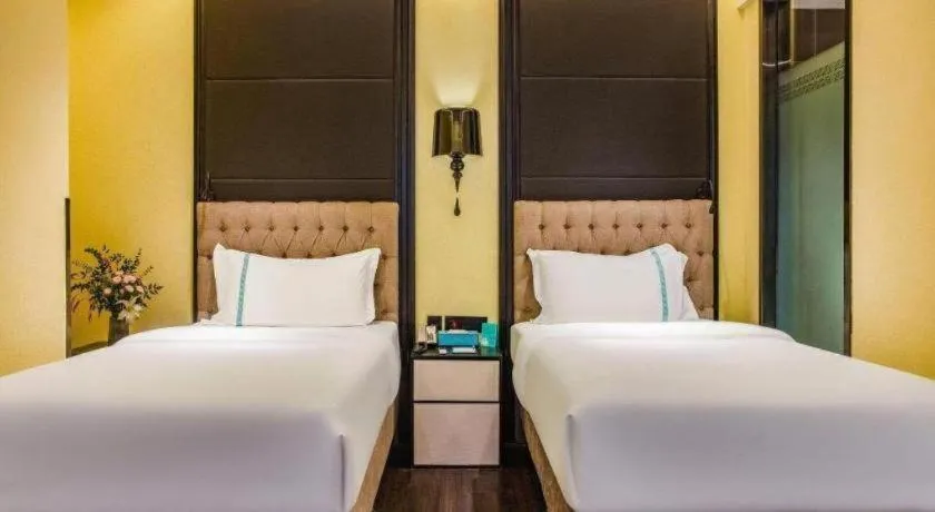 Bed in Xana Hotelle Beijing Olympic Park South Lishuiqiao Metro Station