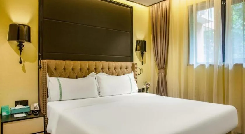 Bed in Xana Hotelle Beijing Olympic Park South Lishuiqiao Metro Station