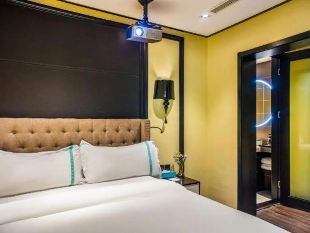 Bed in Xana Hotelle Beijing Olympic Park South Lishuiqiao Metro Station