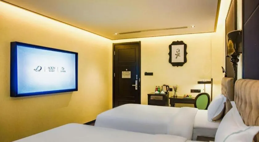 Bed in Xana Hotelle Beijing Olympic Park South Lishuiqiao Metro Station